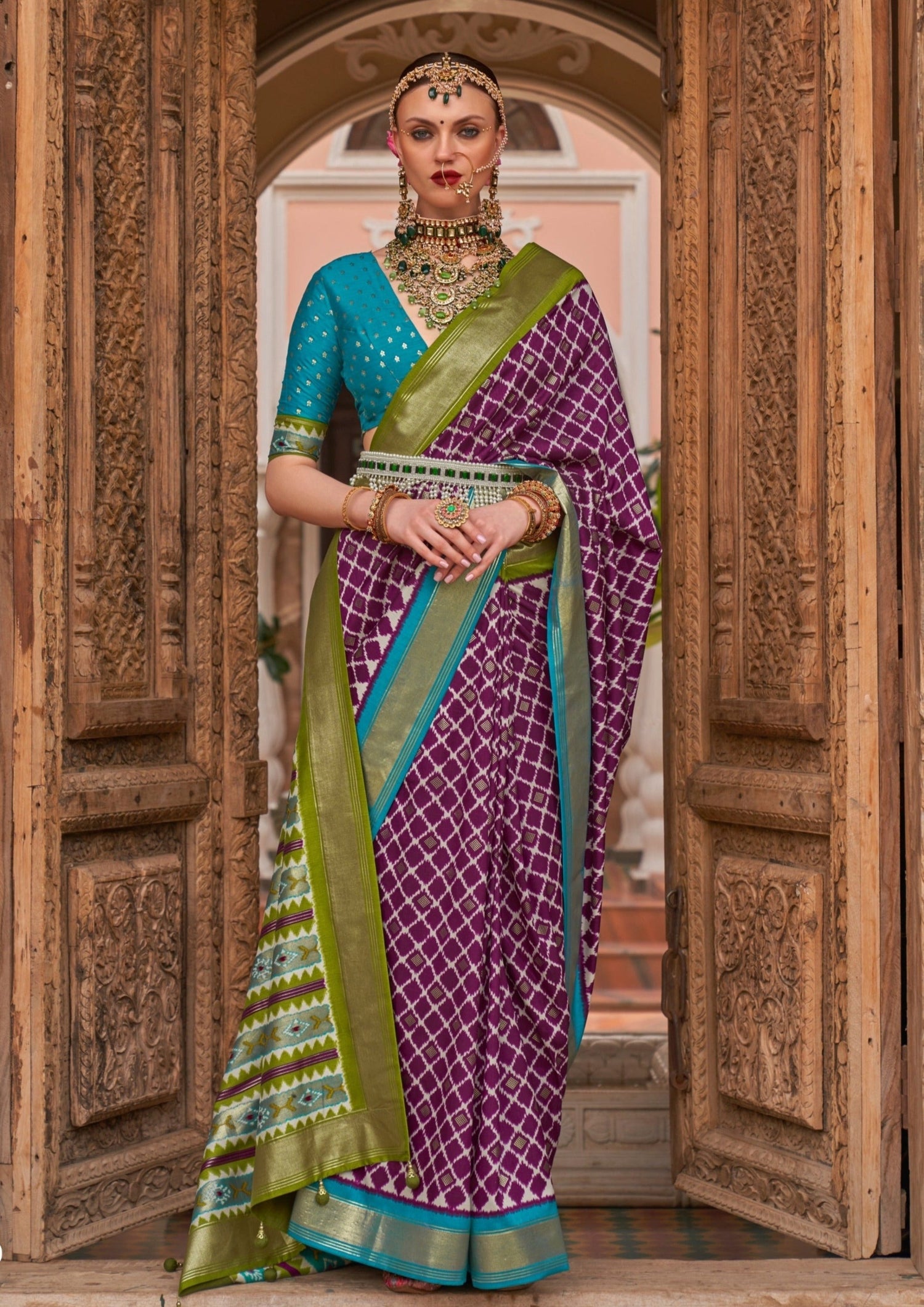 Purple colour double ikkat patola saree online shopping.