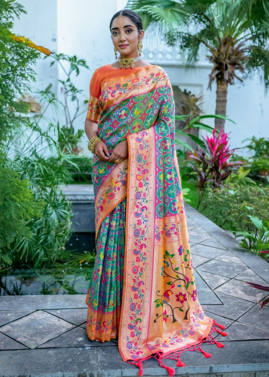 Patola paithani fusion saree online in green colour with contrast orange blouse for wedding.