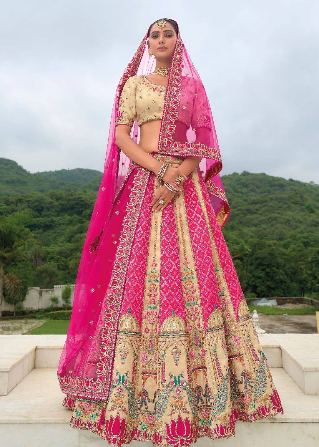 Pink and cream bandhani lehenga choli online for wedding wear & bridal wear.