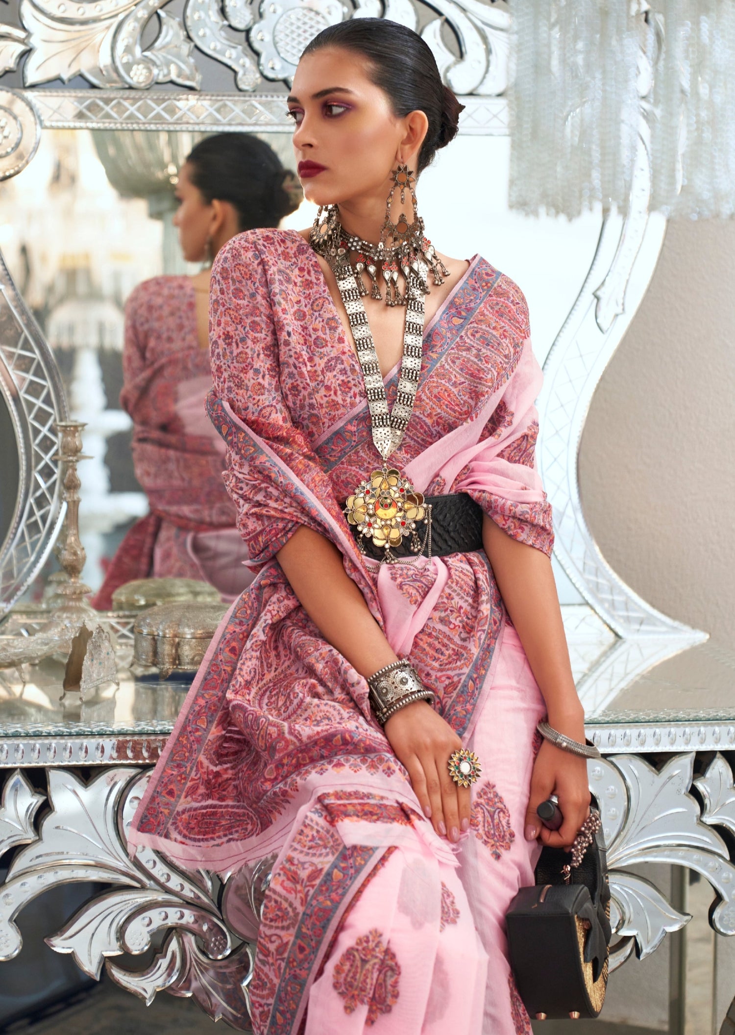 Kashmiri bride in handloom kashmiri silk pink saree blouse.