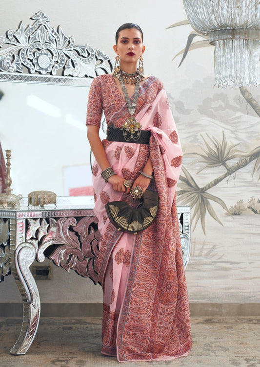 Woman in pink kashmiri silk bridal handloom saree blouse.