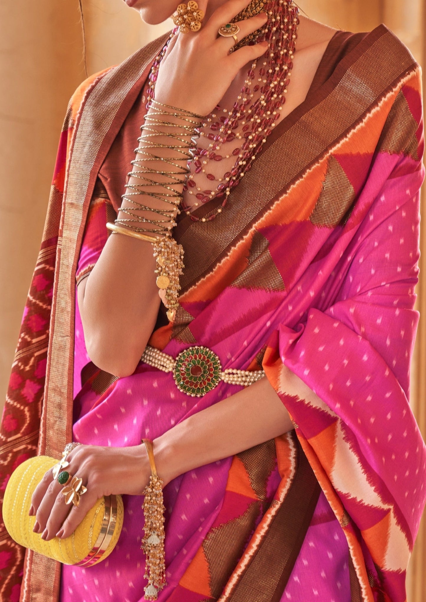 Pink patola silk double ikkat saree design.