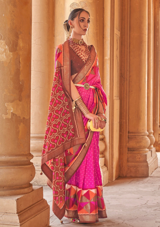 Pink patola silk double ikkat saree with brown blouse.