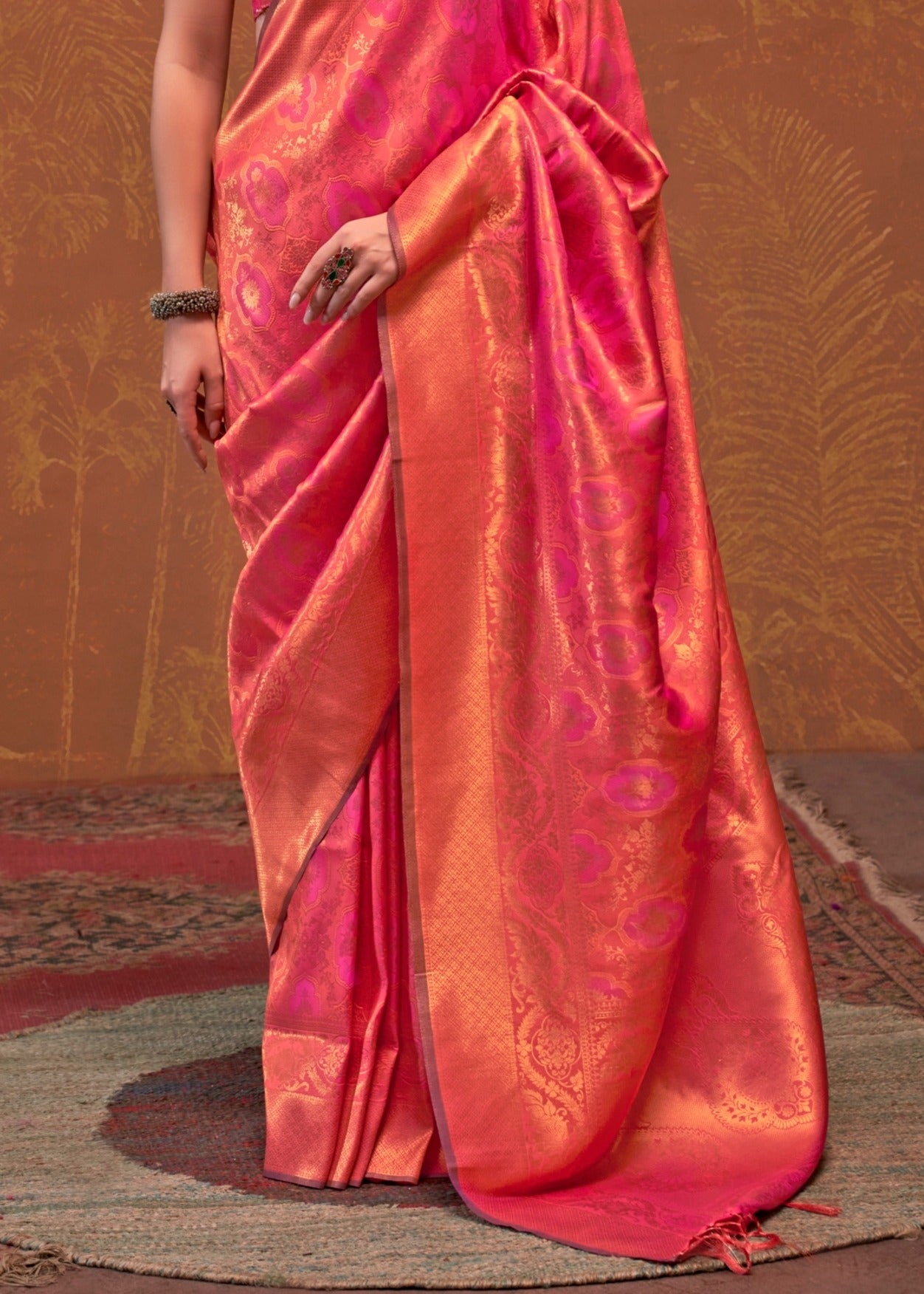 Pink peach banarasi silk saree with contrast blouse online designs in india.