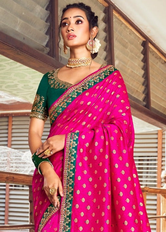 Luxury banarasi dola silk pink saree in usa with heavy embroidered border and contrasting green blouse for diwali party.
