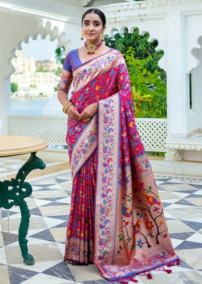 Shop pinkish red banarasi patola paithani handloom silk saree with contrast purple blouse online india & USA in traditional design.