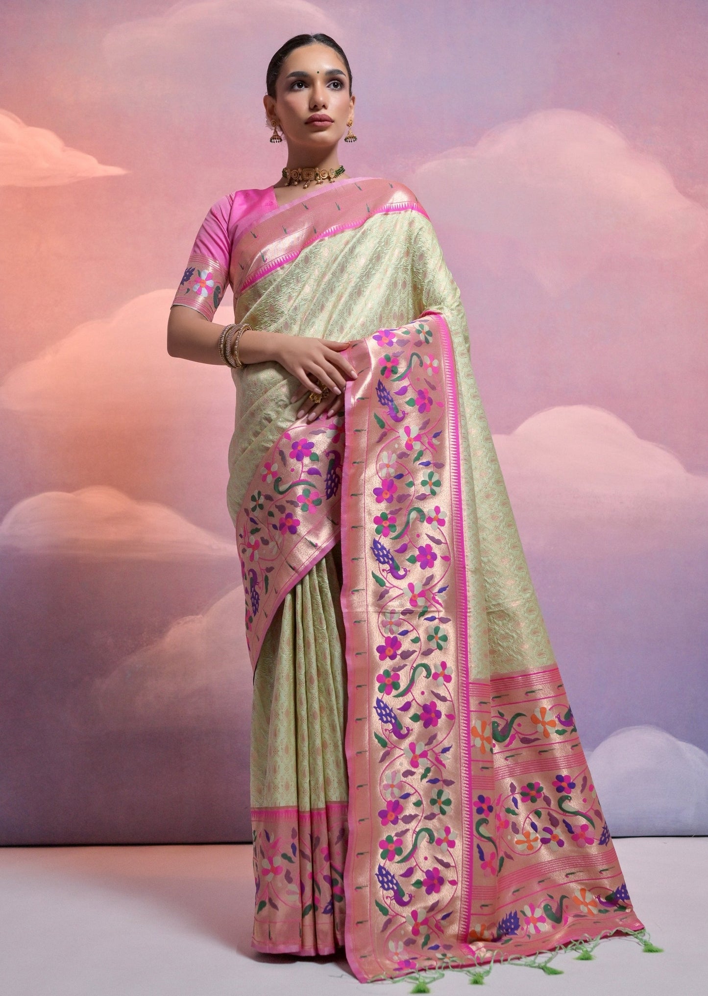Pista green triple muniya border paithani silk handloom saree online.