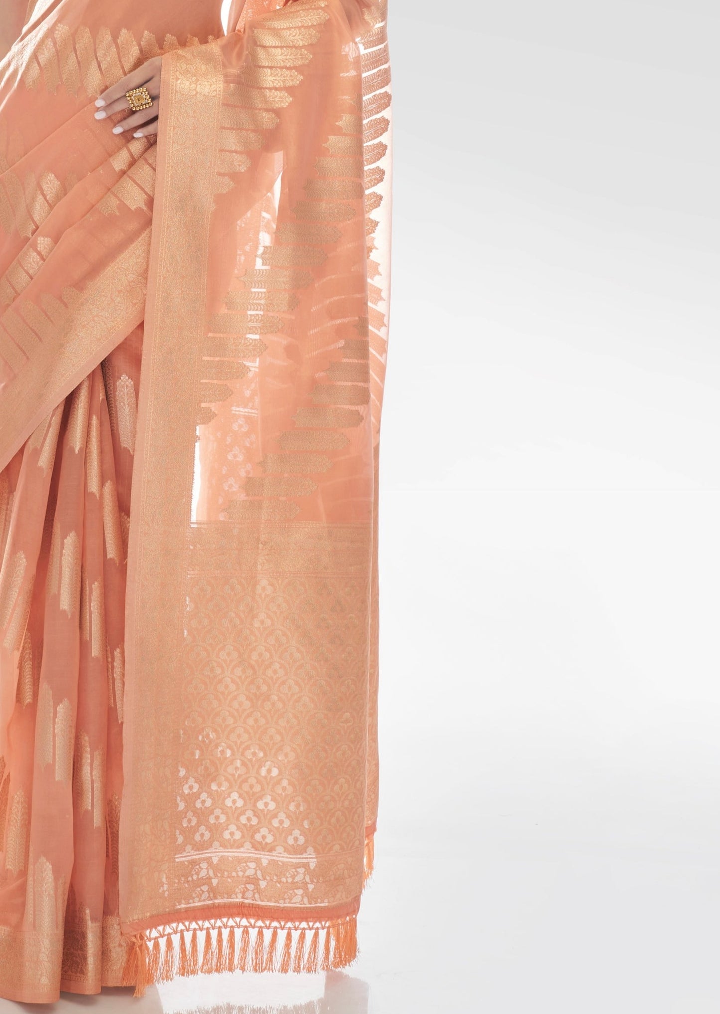 Pure banarasi organza peach saree design usa with zari border work.