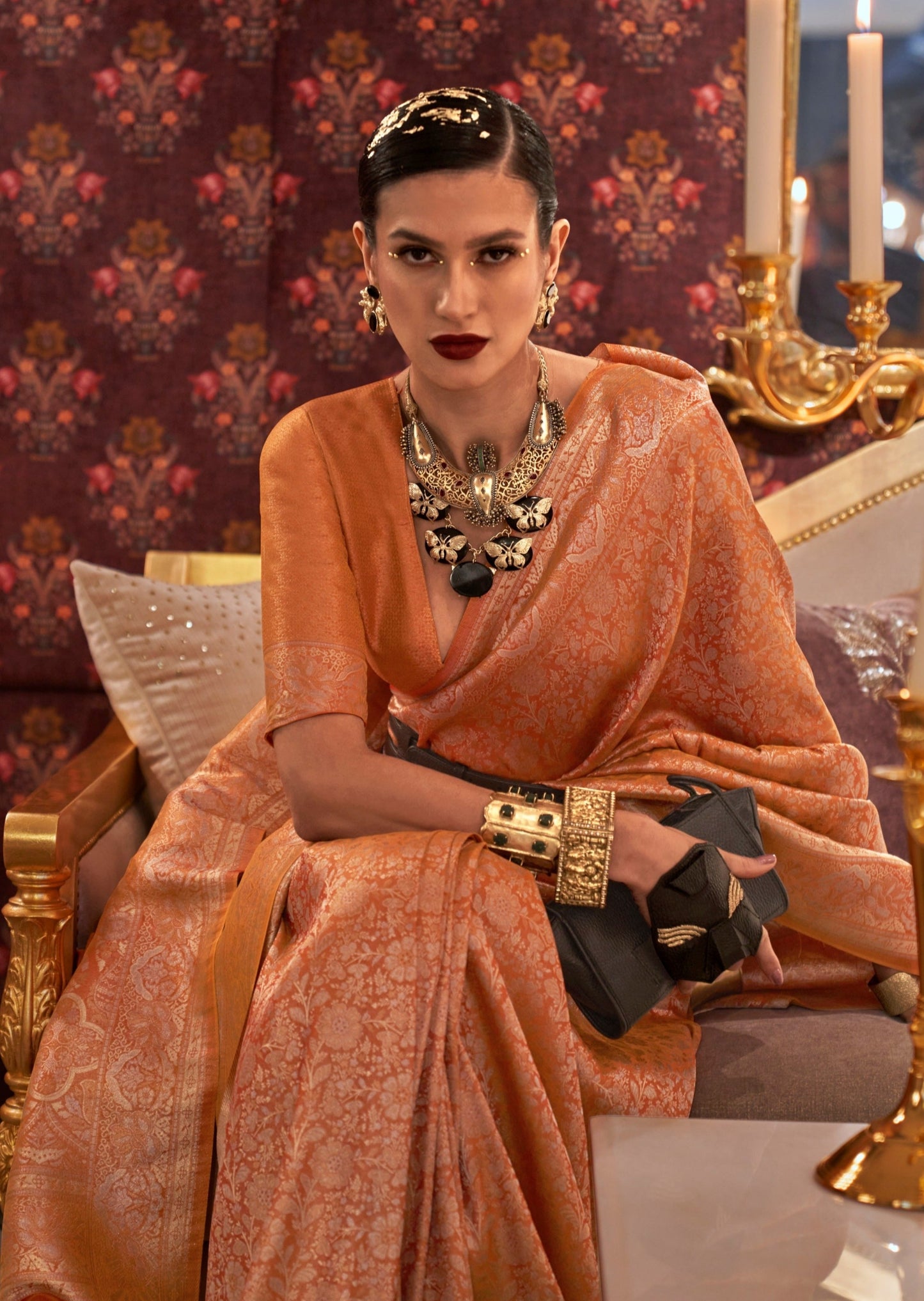 woman standing in Banarasi Silk yellow Handloom Bridal Saree on white sofa
