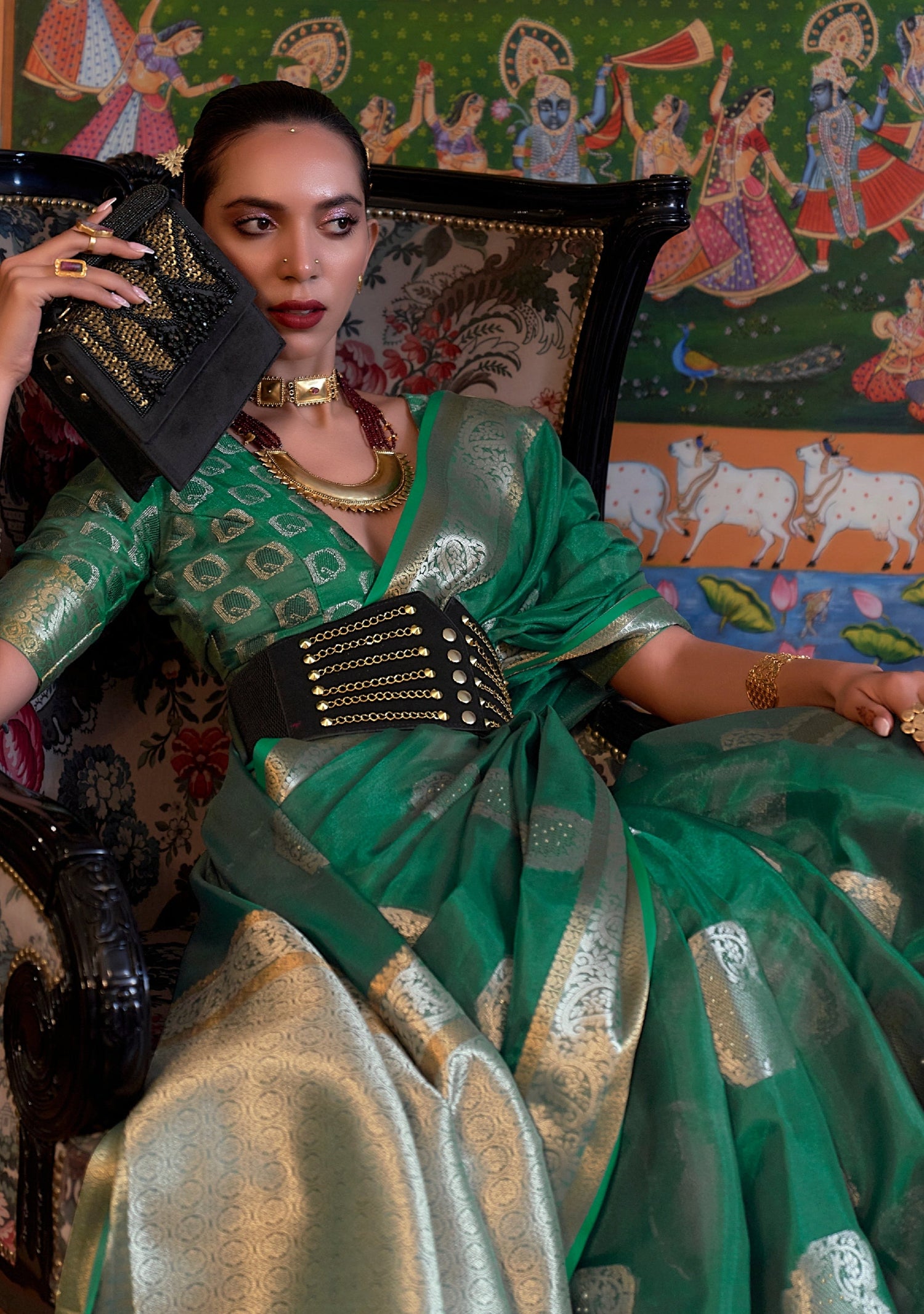 Pure handloom zari banarasi organza saree online in dark green colour.