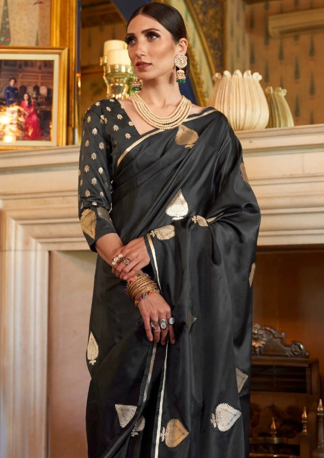 Woman in pure handloom banarasi satin silk black saree blouse.