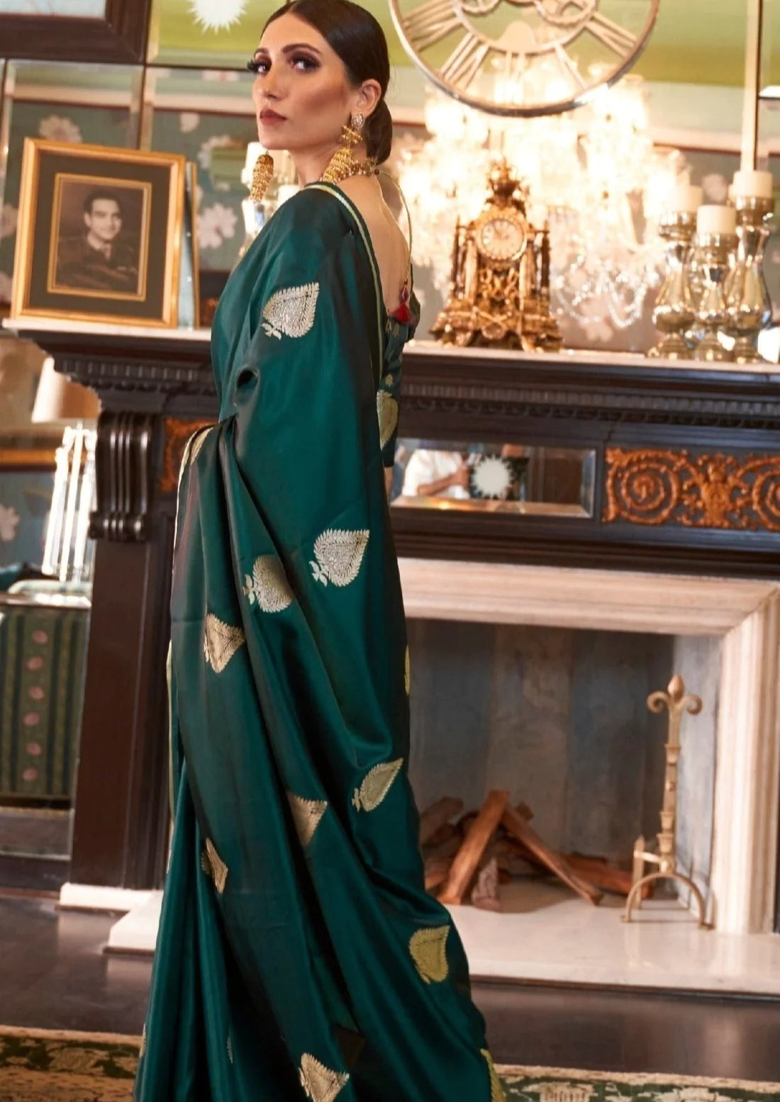 Woman in pure handloom banarasi satin silk green saree blouse.