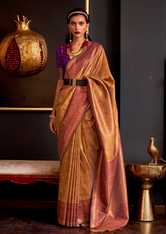 Pure handloom golden kanjivaram silk saree with contrast blouse.