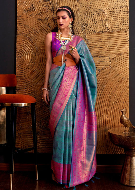 Pure handloom kanjivaram silk blue saree with contrast pink blouse.