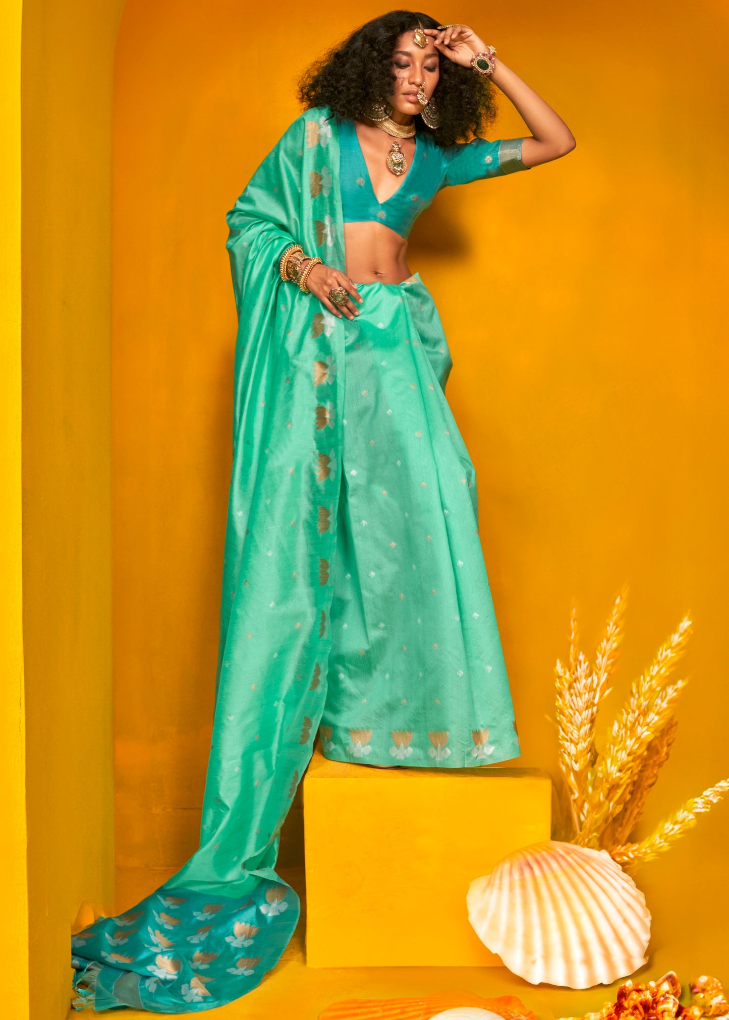 Elegant pure handloom tussar silk saree in ocean green and deeper green hues, showcasing a sophisticated look.