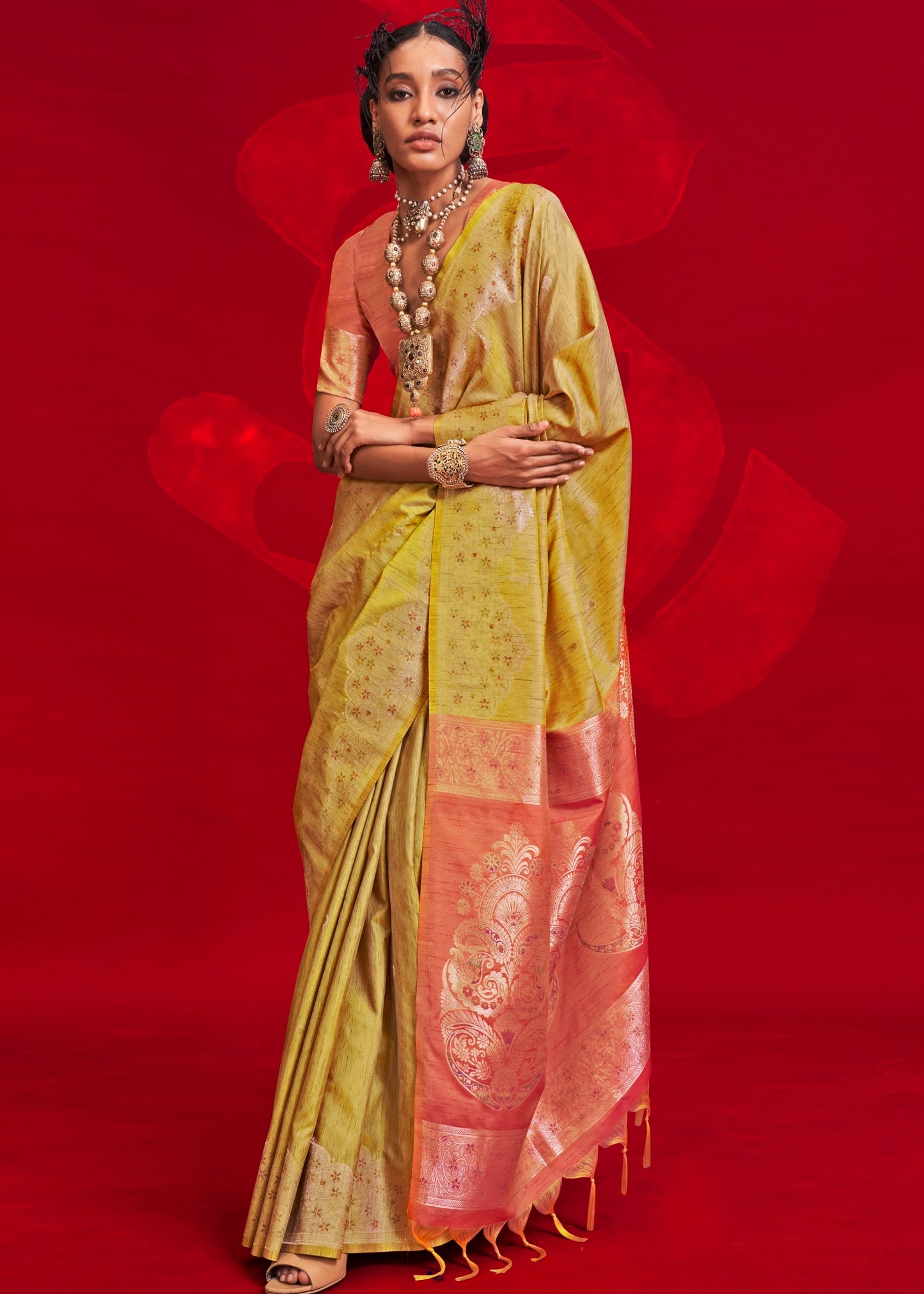 Elegant pure handloom tussar silk yellow saree with orange blouse for traditional indian wear.