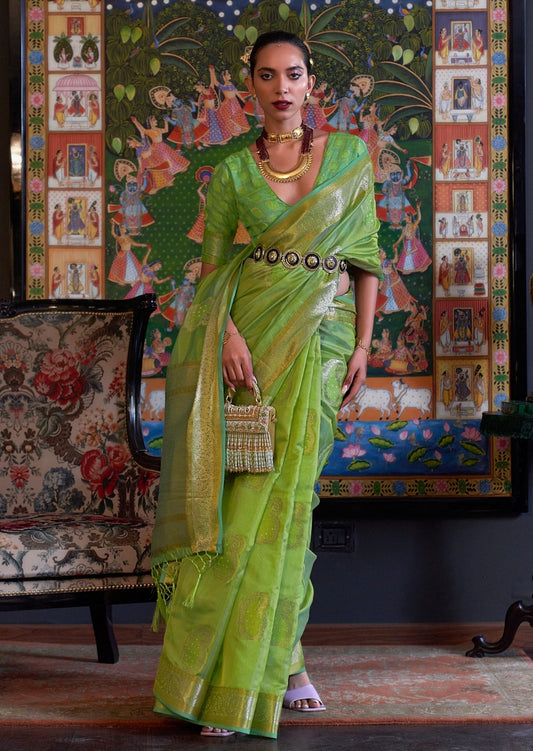 Woman's light green color banarasi organza saree online with zari work.