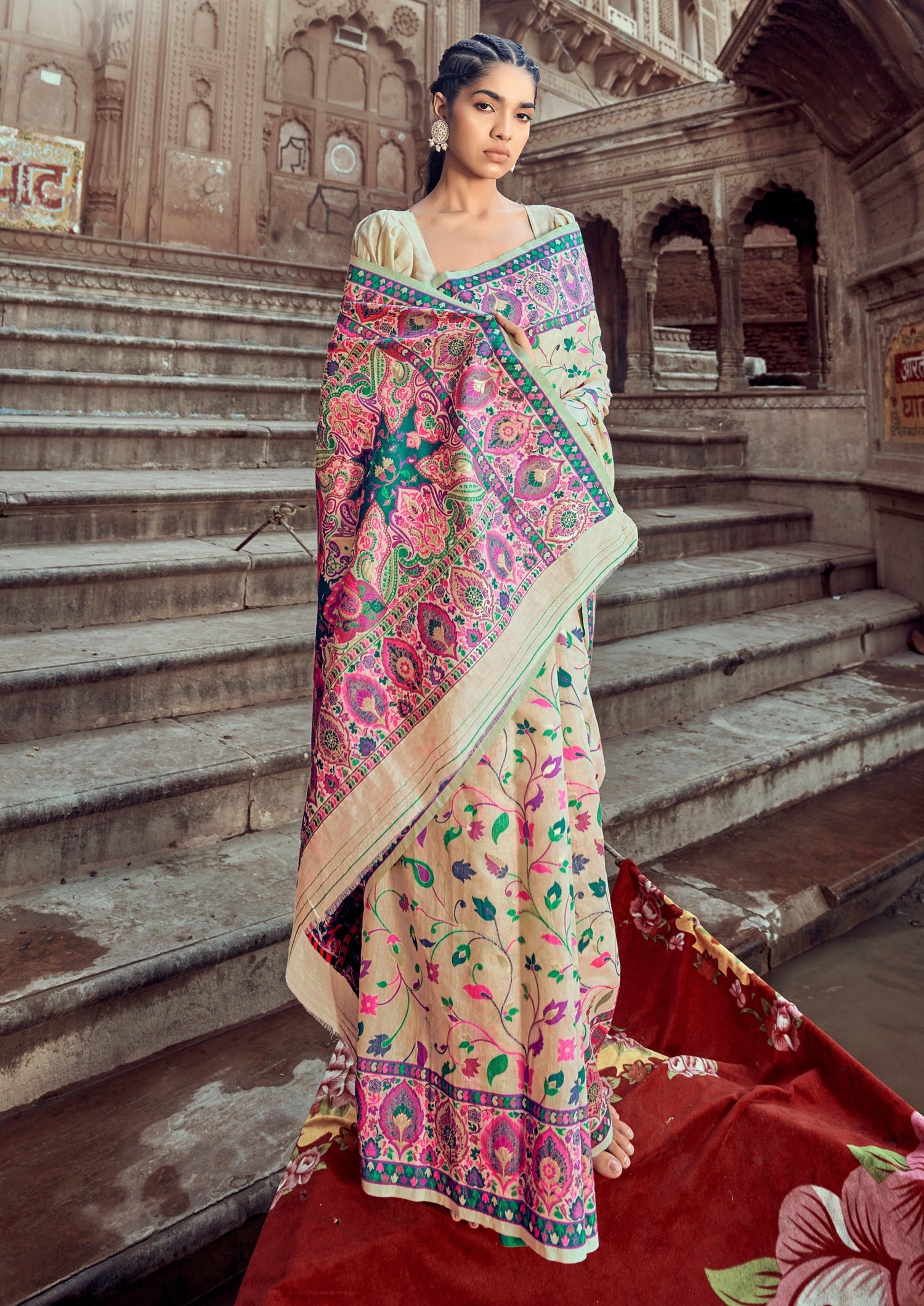 woman standing in front of stairs on boat in Pure Kashmiri Pashmina Silk Embroidered Cream Handloom Saree