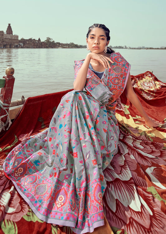 woman sitting in boat wearing Pure Kashmiri Pashmina Silk Embroidered Grey Handloom Saree