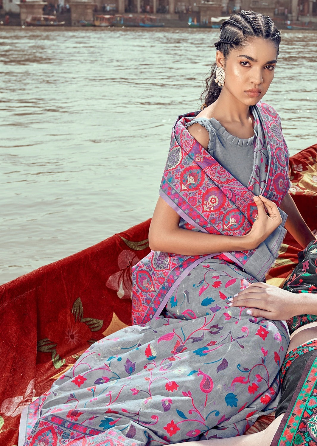 woman sitting in Pure Kashmiri Pashmina Silk Embroidered Grey Handloom Saree on sea shore