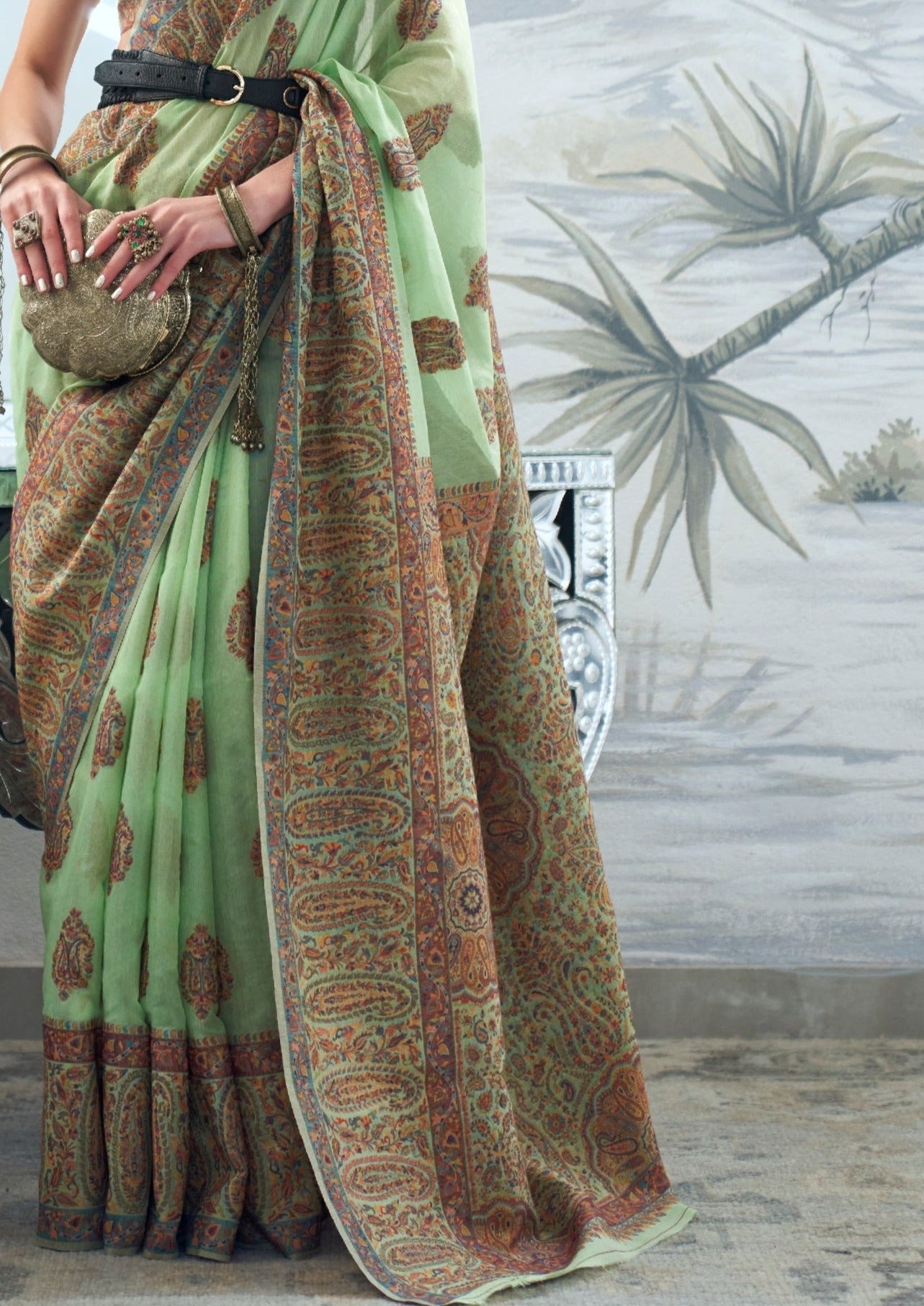 Pure kashmiri silk handloom light green party wear saree design.