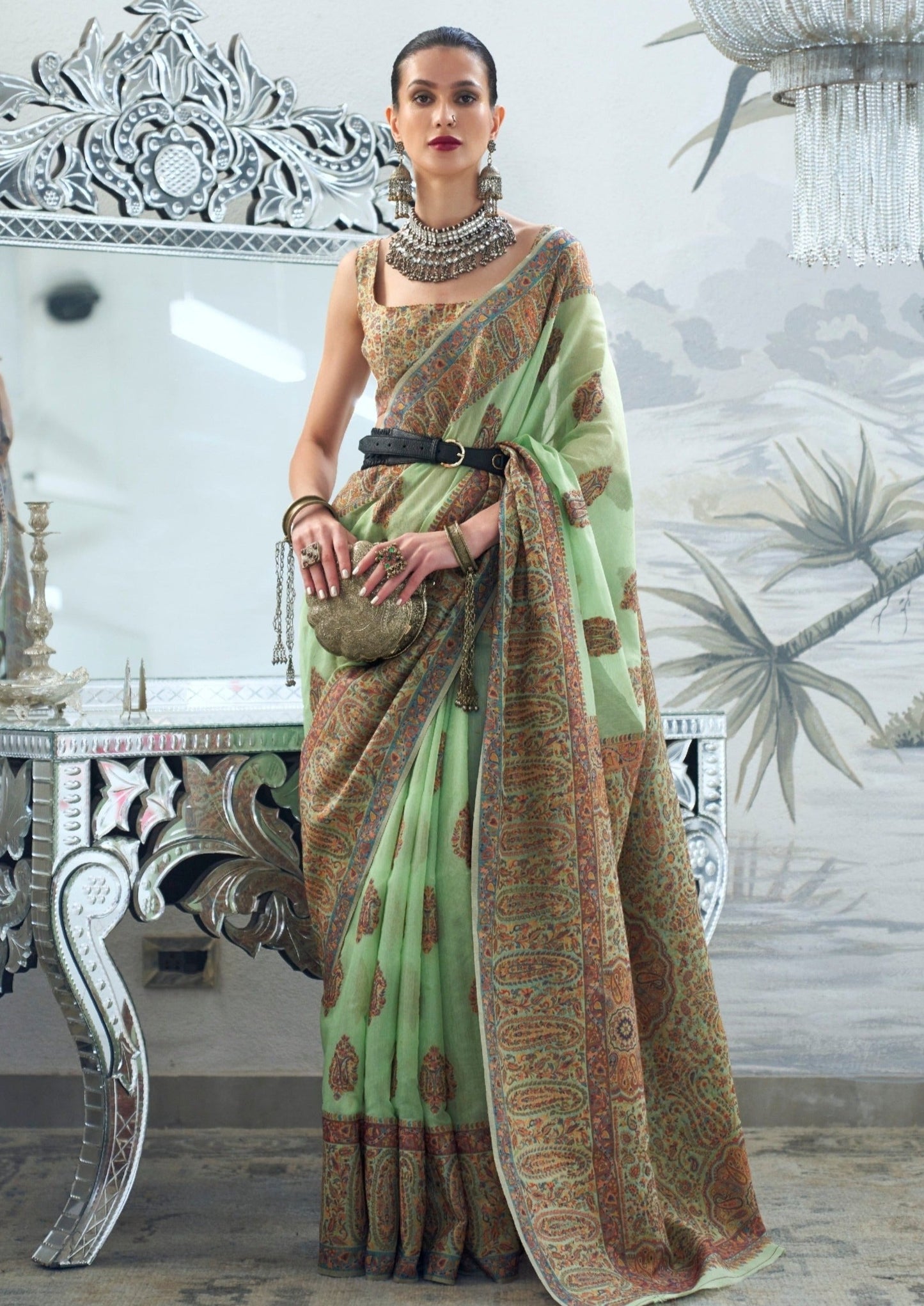 Woman in pure kashmiri silk handloom light green saree blouse online.