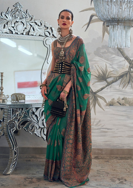 Kashmiri bride in handloom kashmiri silk dark green saree blouse.
