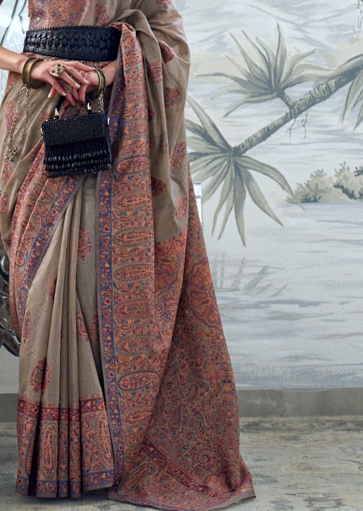 Pure handloom kashmiri silk kani hand embroidery grey saree design.
