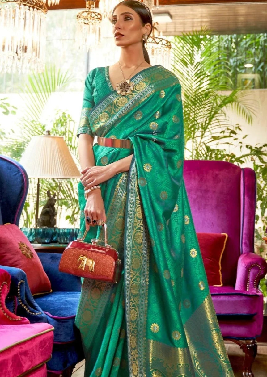 Shop pure katan silk banarasi handloom saree online in green color for wedding wear and bridal look.