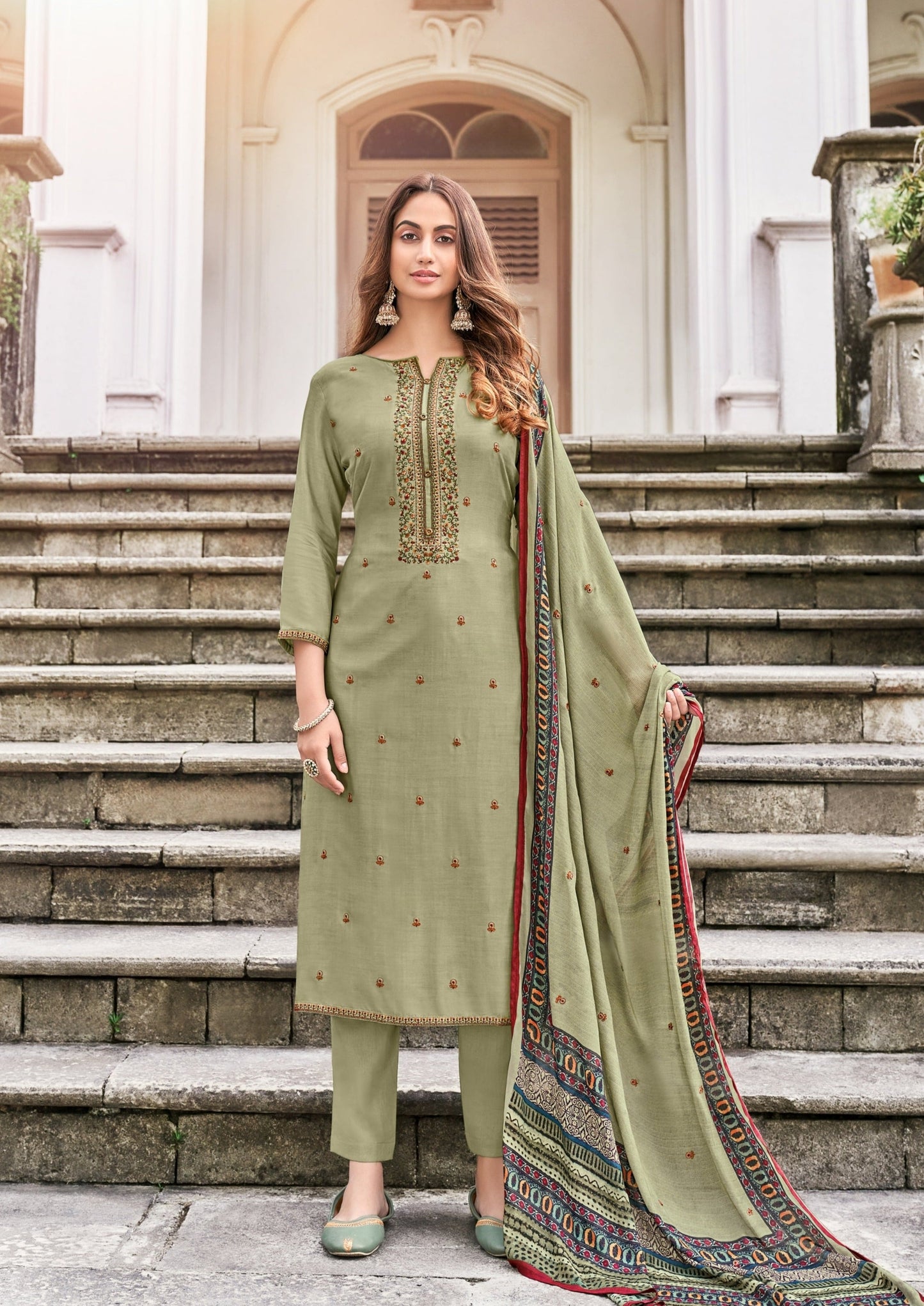 Woman in green pure muslin salwar suit