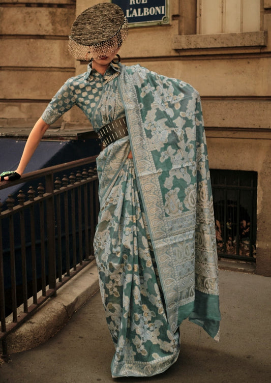 Woman in green organza lucknowi chikankari saree blouse.