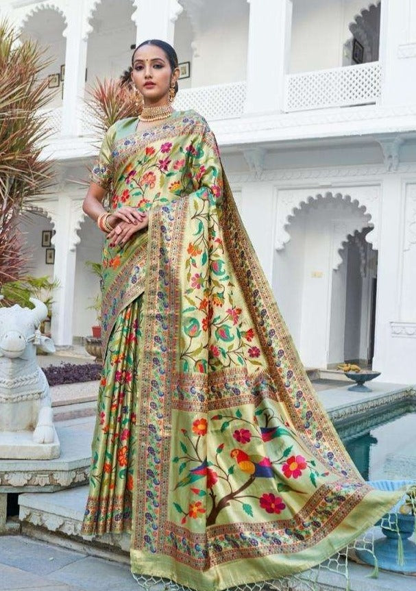 Woman in green kadiyal paithani saree online with price.