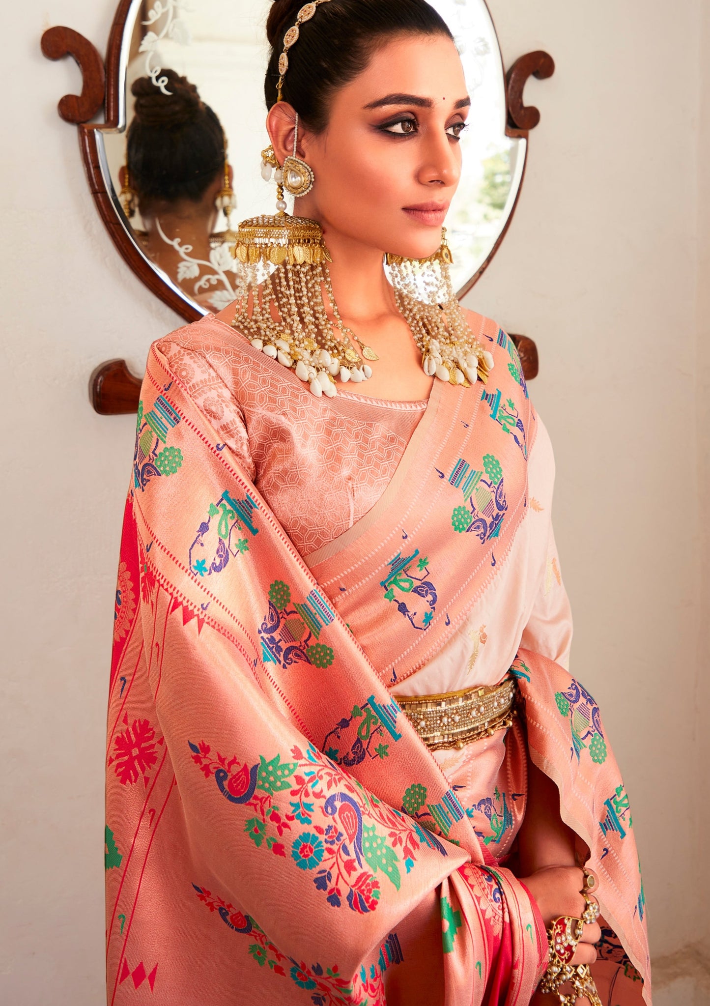 Bride in off white color Paithani silk saree blouse