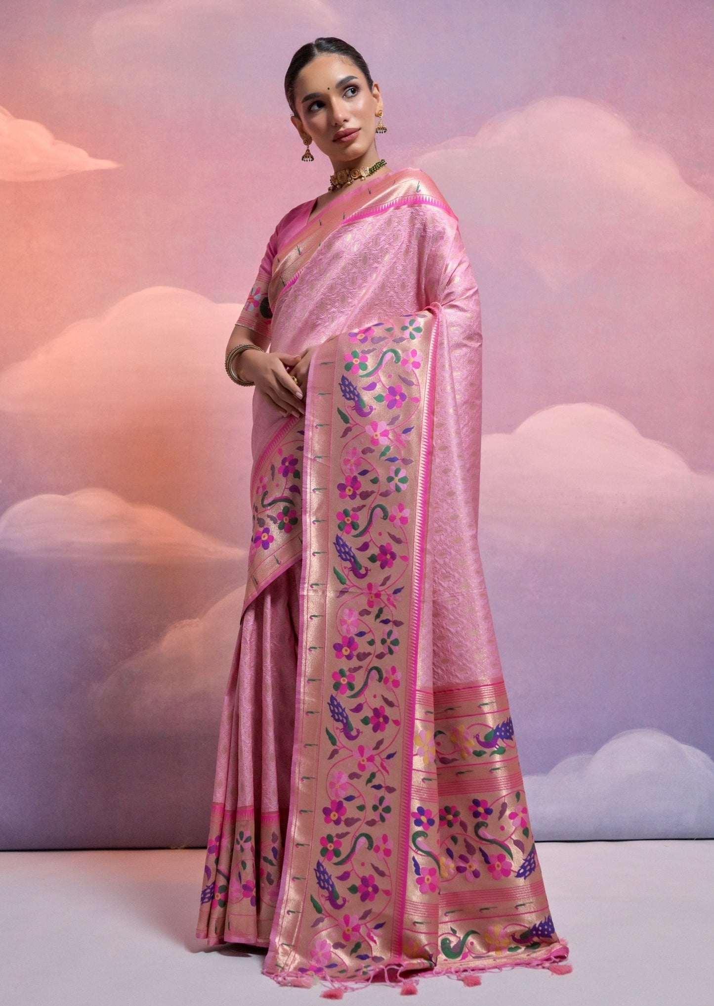 Pure paithani silk pastel pink handloom saree with muniya border.