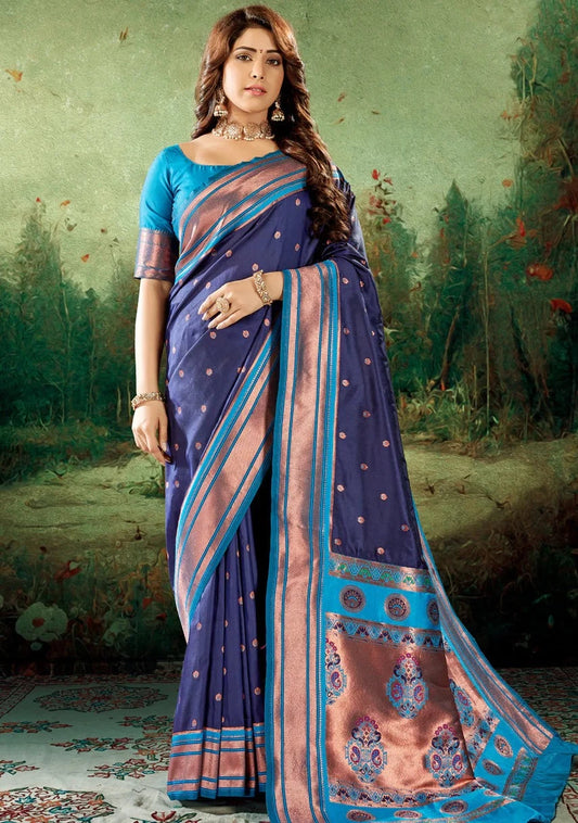 woman in copper zari peshwai saree in blue colour with contrast blouse