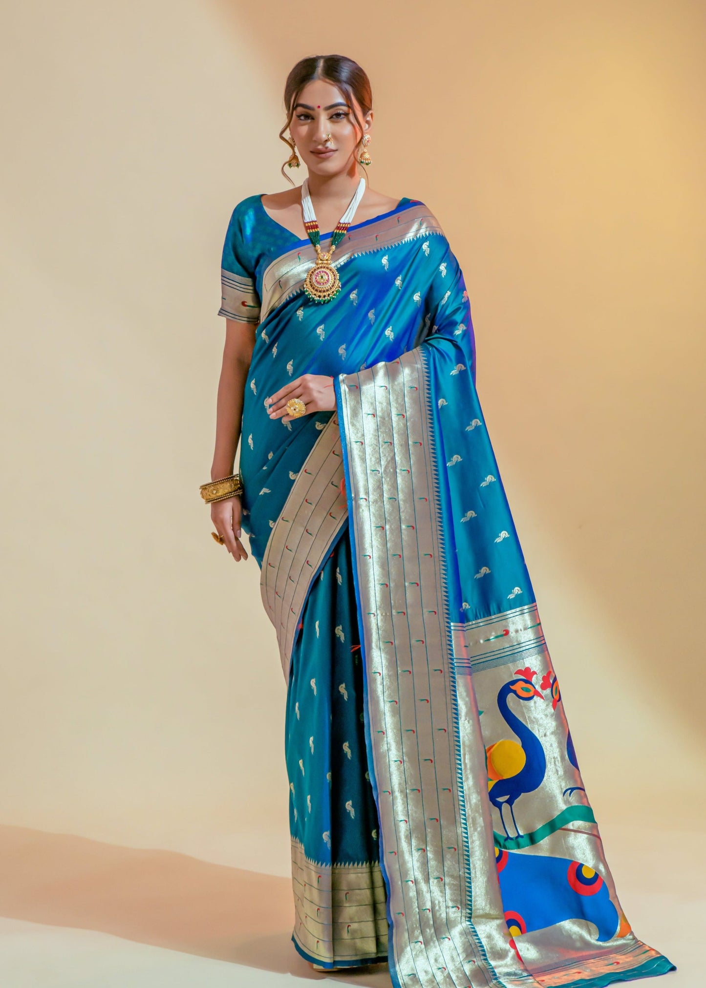 Pure paithani silk teal blue handloom saree online india for wedding.