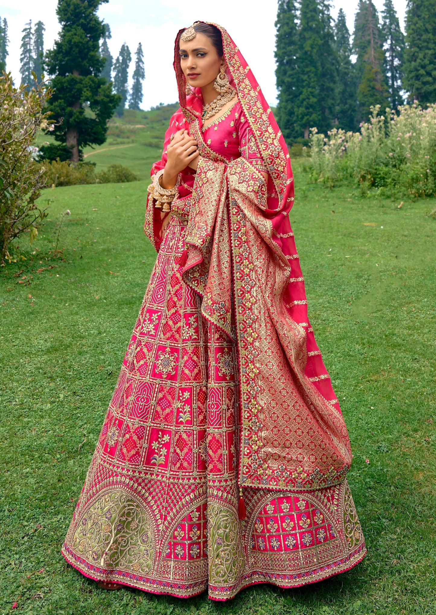 Pure silk red bridal luxury bandhani lehenga choli with dupatta online for wedding.
