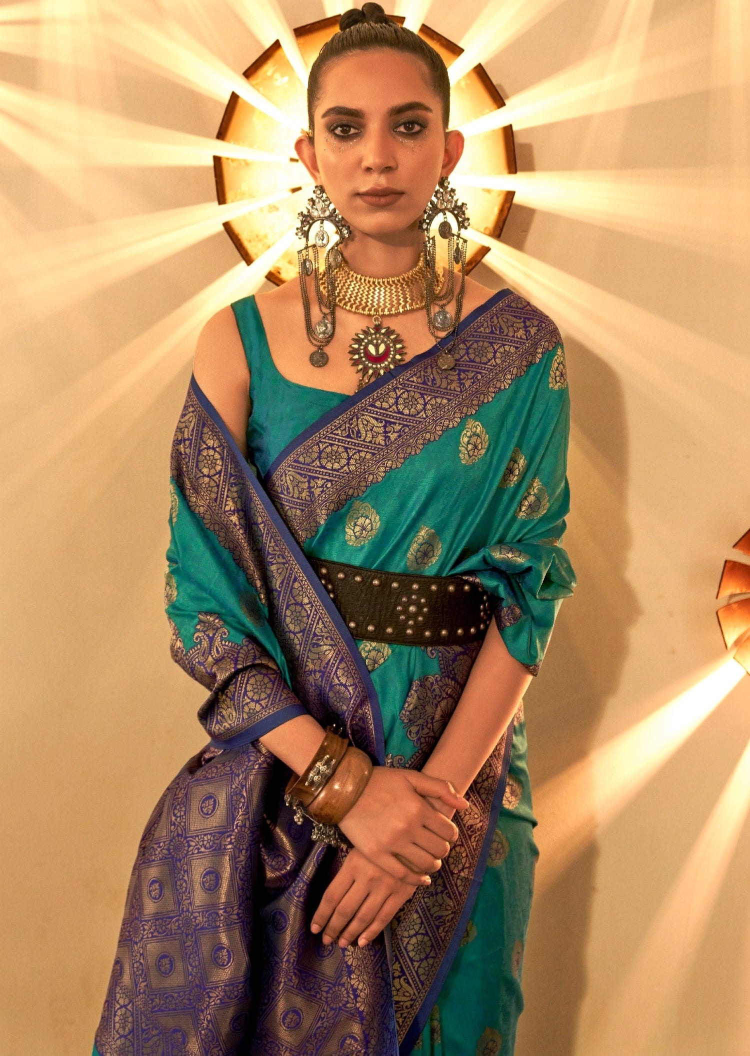 Women's green zari silk saree with blue border online shopping.