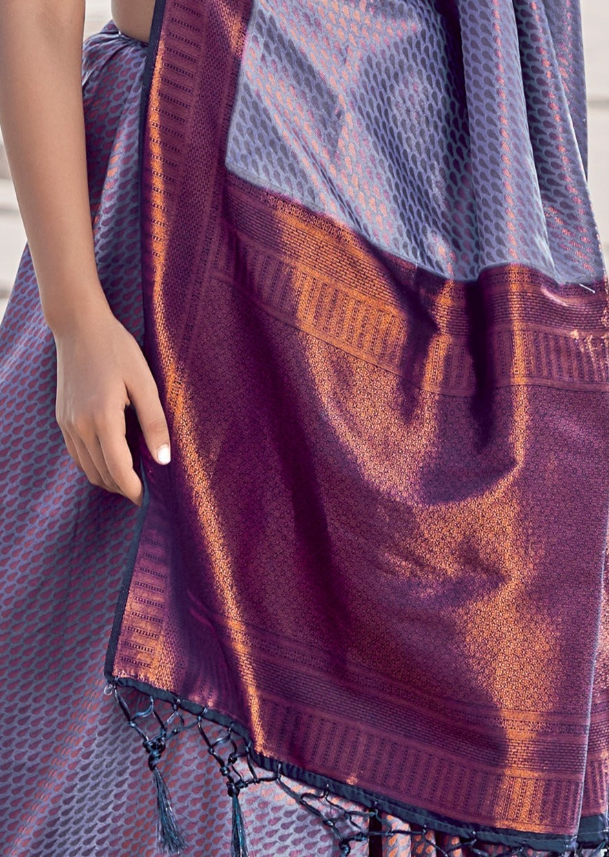 Purple kanjivaram silk handloom copper zari saree designs online sale for wedding.