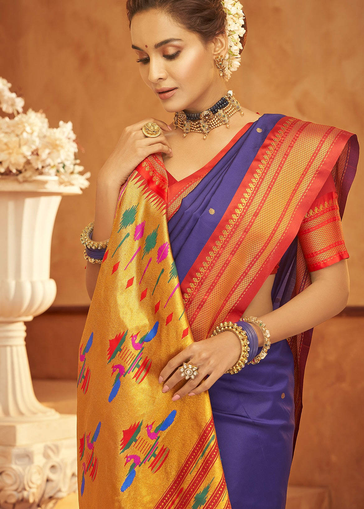 Purple paithani silk saree with contrast red blouse combination online shopping.