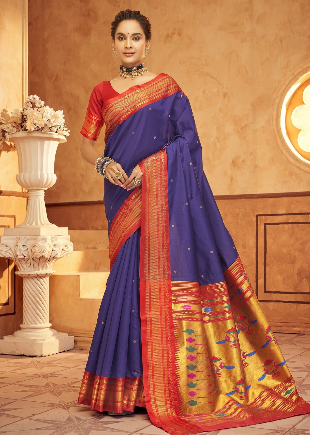 Purple paithani silk saree with contrast red blouse online shopping in india for bridal wear.