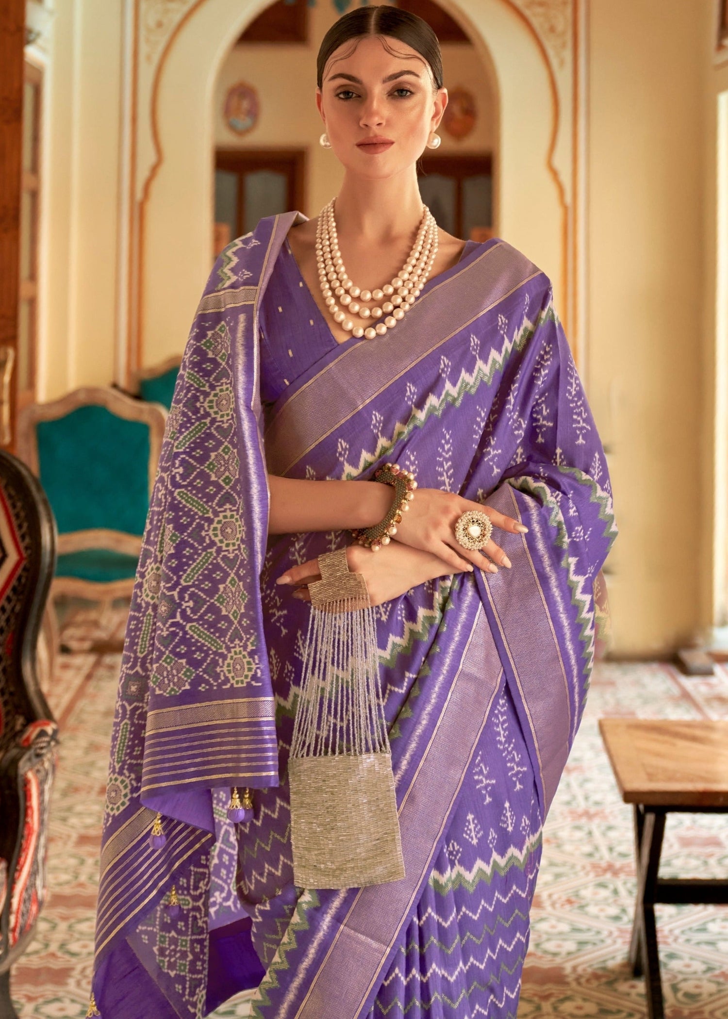 Pastel purple patola saree online design for wedding function.