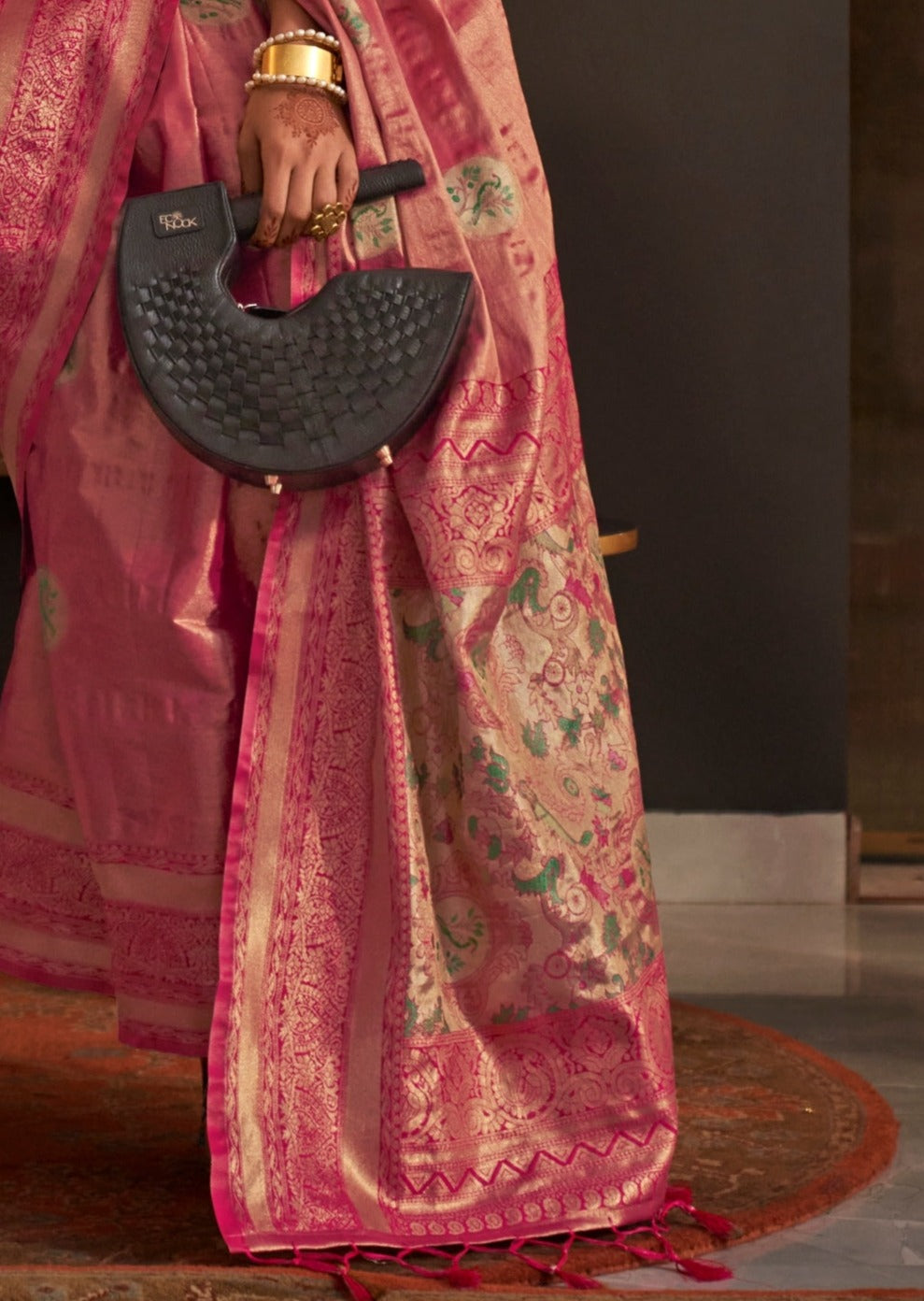 Banarasi silk zari saree pallu design in rani pink color.