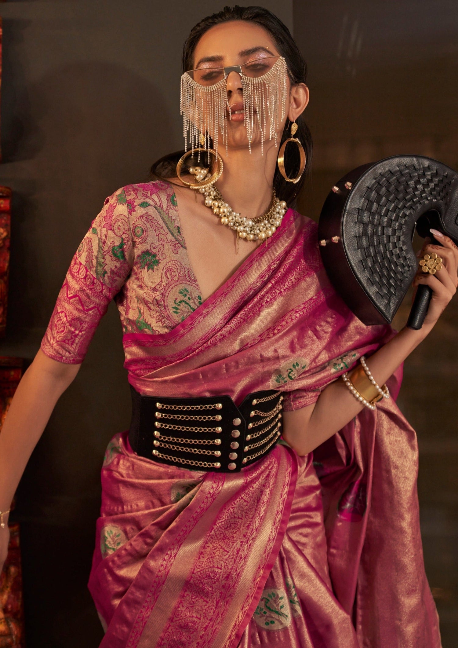 Bride in rani pink pure banarasi silk handloom zari saree blouse.