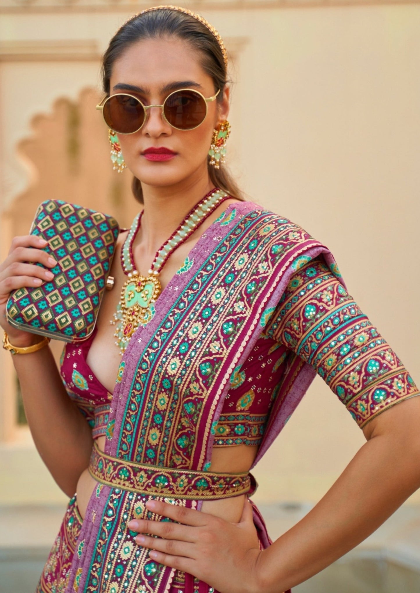 Bridesmaid in pink lehenga.