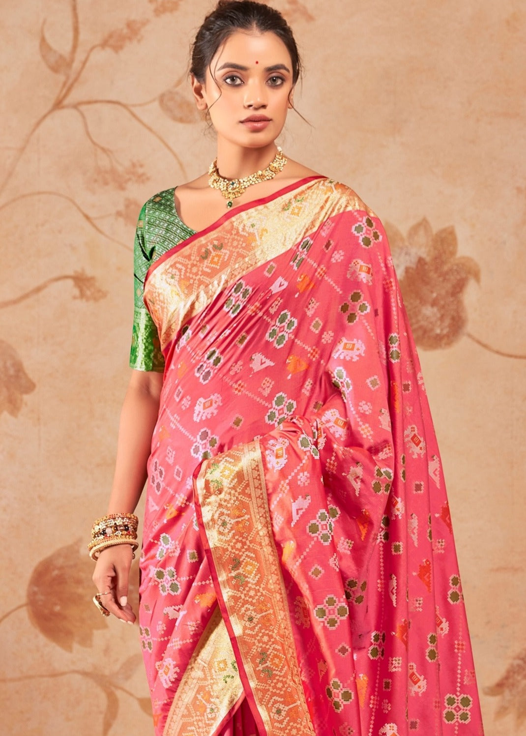 Red banarasi patola silk saree online shopping with green blouse having pure gold zari weaving.