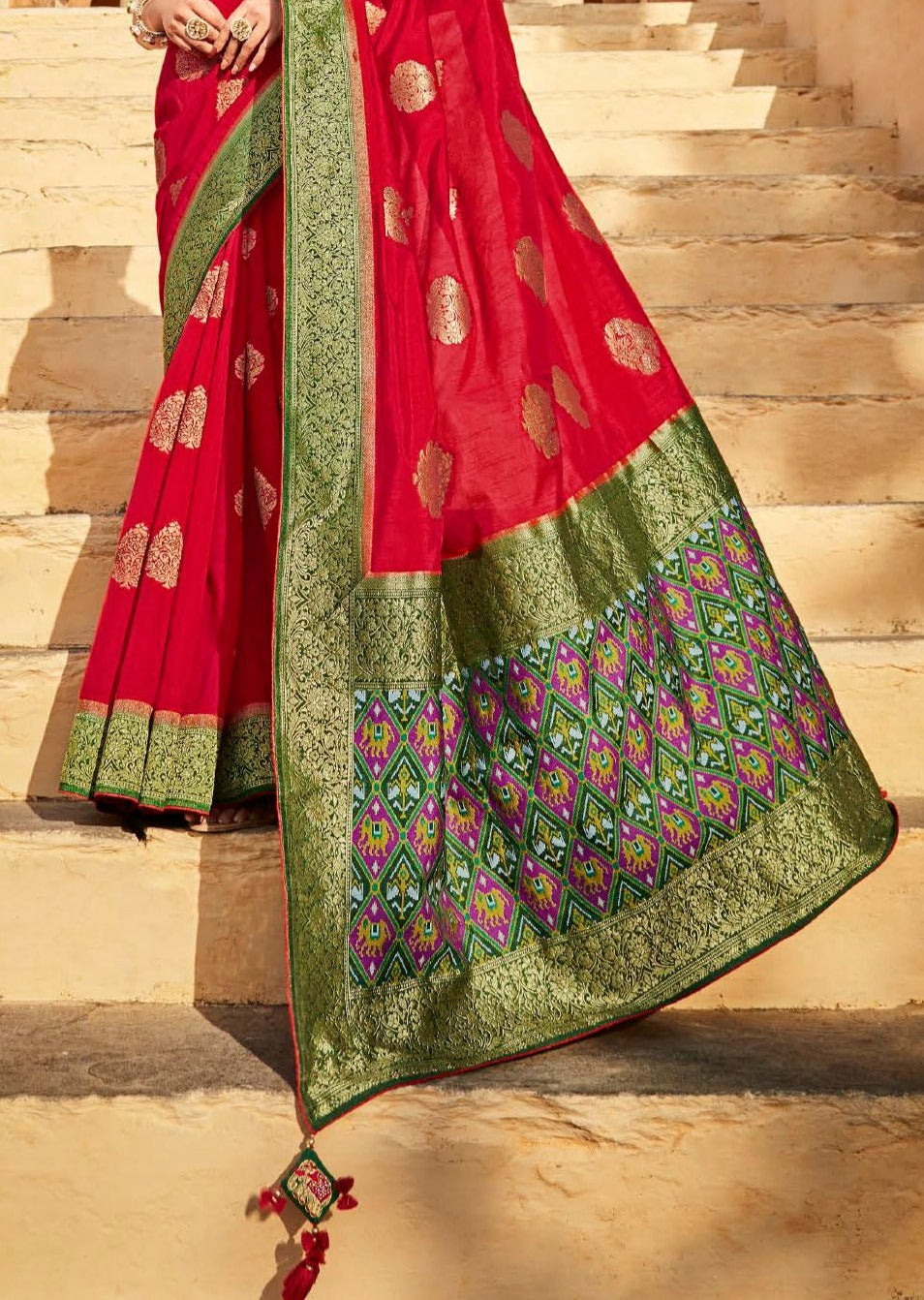 Red banarasi patola silk handloom saree online in traditional designs.