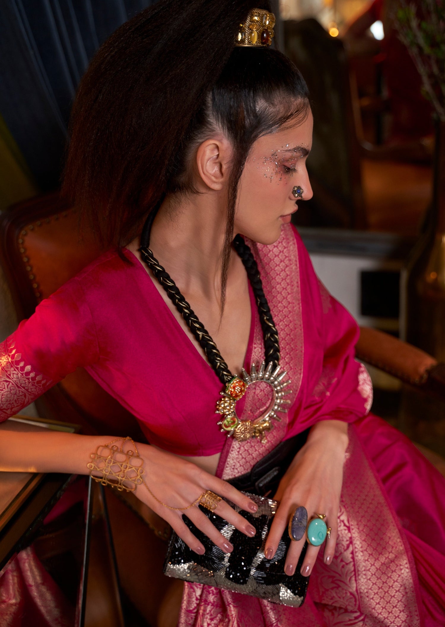 Woman in red khaddi georgette banarasi saree blouse.