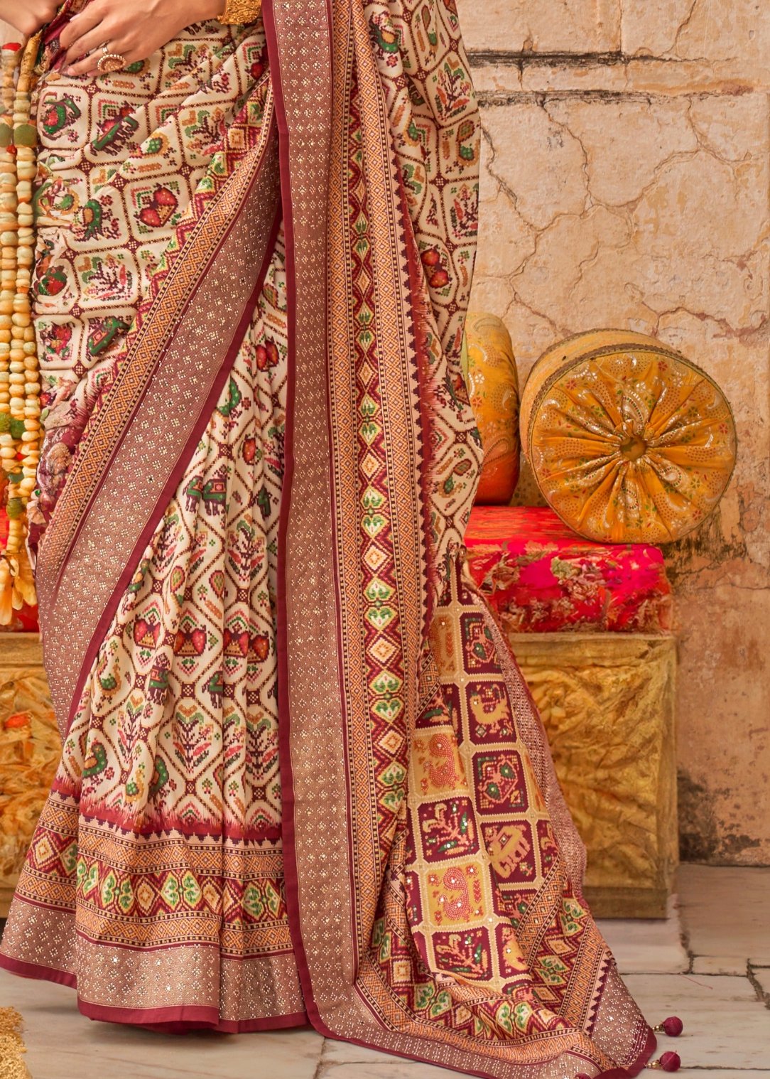 Red patola silk saree online designs for bride and women.