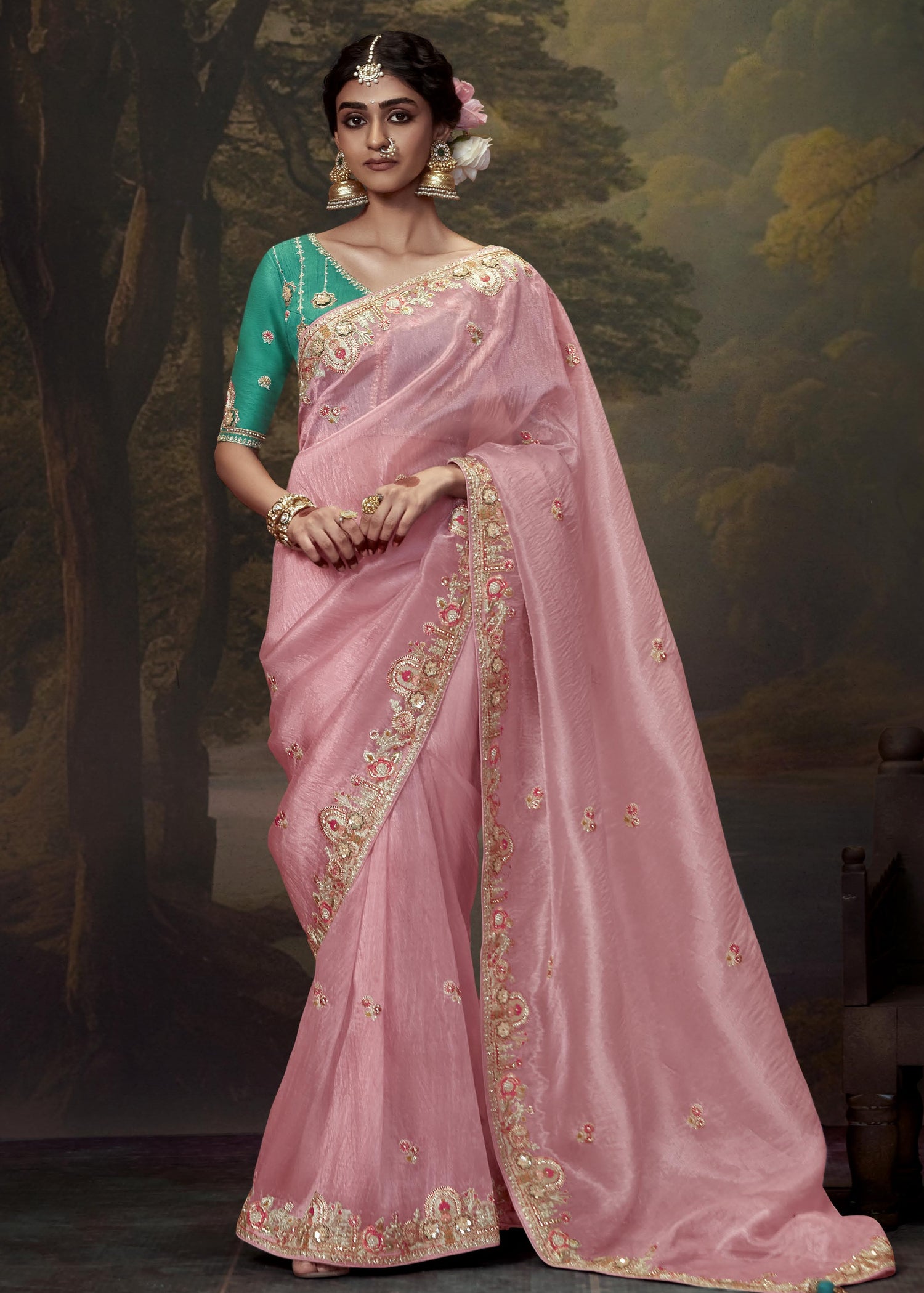 Rose pink crushed tissue silk saree with handwork embroidery and contrast green blouse piece for wedding occasions in USA.